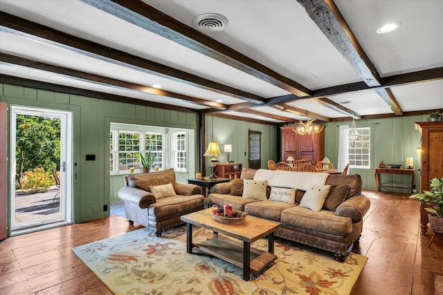 2066 County Road 125 E, Mahomet, IL 61853 - living area with beam ceiling, wood-type flooring, an inviting chandelier, and visible vents