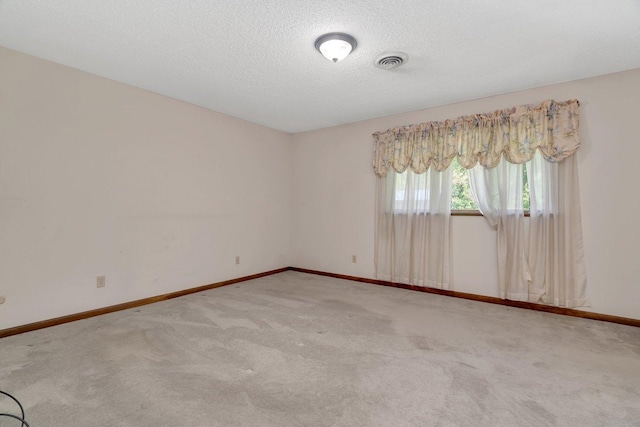 5815 E S Prairie Dr, Morris, IL 60450 - carpeted spare room featuring baseboards and a textured ceiling