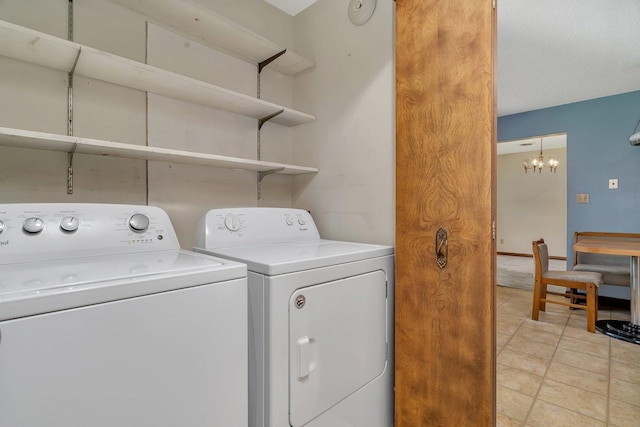 5815 E S Prairie Dr, Morris, IL 60450 - laundry room with independent washer and dryer and a chandelier