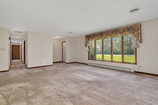 5815 E S Prairie Dr, Morris, IL 60450 - carpeted empty room featuring a baseboard heating unit and baseboards
