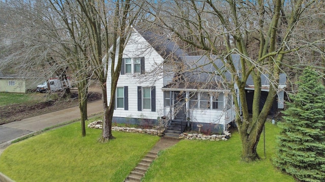 view of front of house featuring a front yard and entry steps