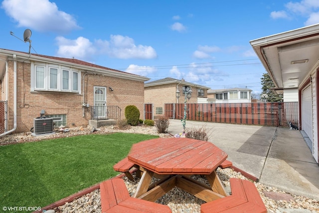 605 Saginaw Ave, Calumet City, IL 60409 - exterior space with central air condition unit and fence