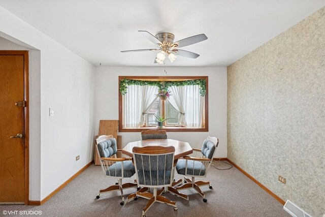 605 Saginaw Ave, Calumet City, IL 60409 - carpeted dining room with baseboards, wallpapered walls, visible vents, and a ceiling fan