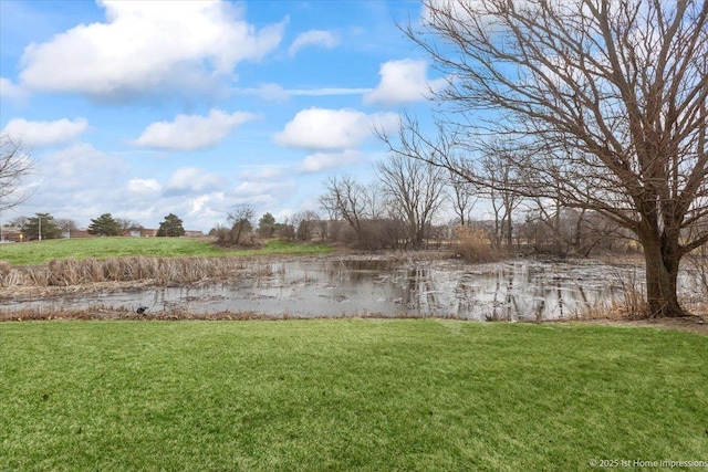 view of yard with a water view
