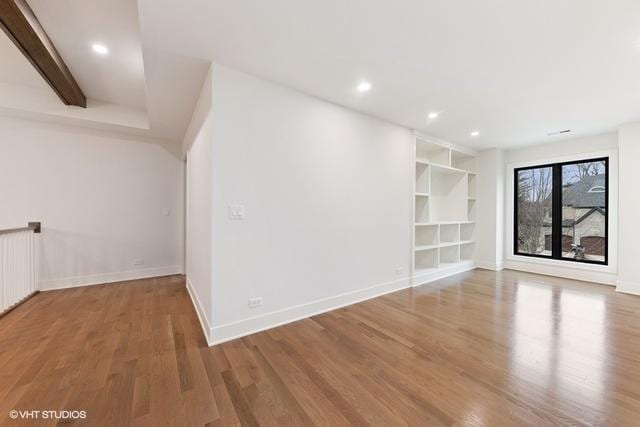 260 E Grantley Ave, Elmhurst, IL 60126 - spare room featuring wood finished floors, built in features, baseboards, beamed ceiling, and recessed lighting
