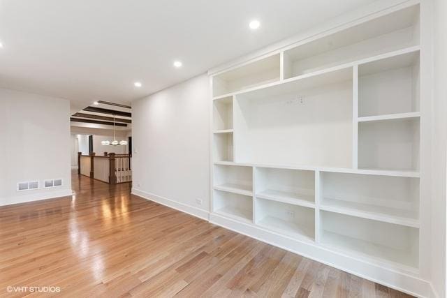 260 E Grantley Ave, Elmhurst, IL 60126 - empty room with visible vents, wood finished floors, built in features, and recessed lighting