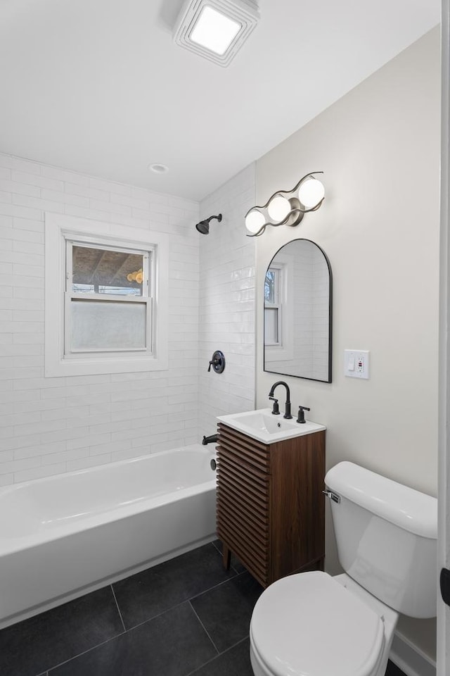 full bathroom featuring tile patterned floors, shower / tub combination, toilet, and vanity