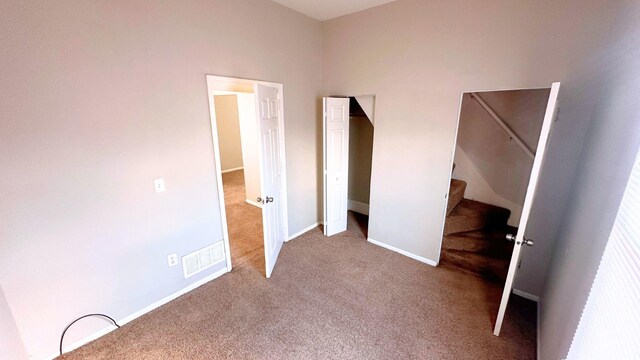2830 Bernice Rd, Lansing, IL 60438 - unfurnished bedroom featuring carpet floors, baseboards, and visible vents