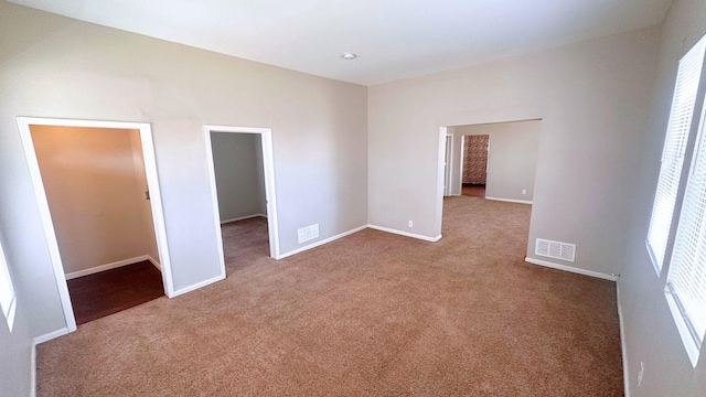 2830 Bernice Rd, Lansing, IL 60438 - carpeted spare room with baseboards and visible vents