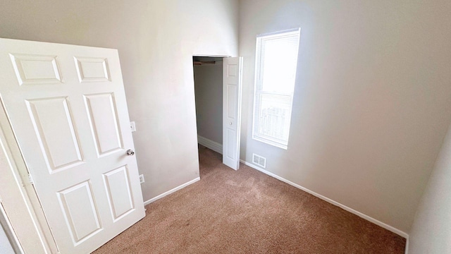 2830 Bernice Rd, Lansing, IL 60438 - unfurnished bedroom featuring baseboards, carpet flooring, and visible vents