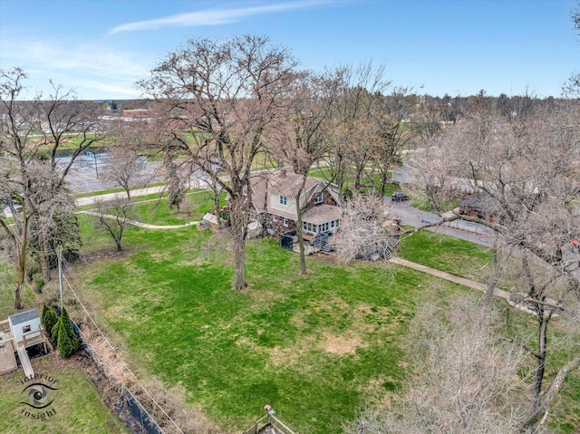 aerial view of property and surrounding area with a large body of water