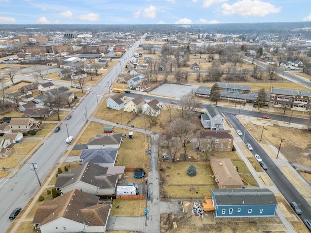 birds eye view of property with a residential view