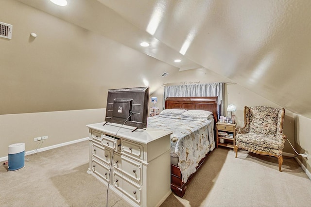 bedroom featuring light carpet, baseboards, vaulted ceiling, and visible vents
