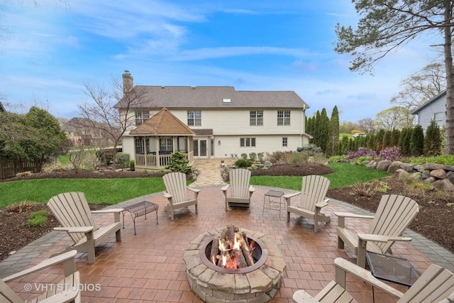 view of patio featuring an outdoor fire pit
