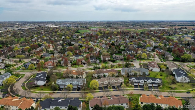 birds eye view of property with a residential view