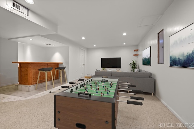 rec room with visible vents, baseboards, a dry bar, recessed lighting, and carpet