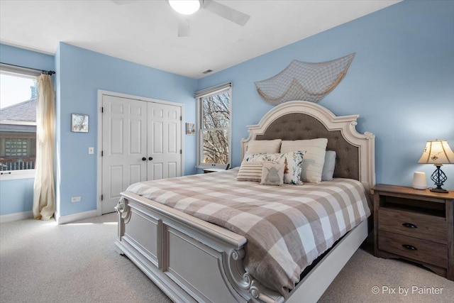 623 Oakton St, Evanston, IL 60202 - carpeted bedroom with baseboards, a closet, and ceiling fan