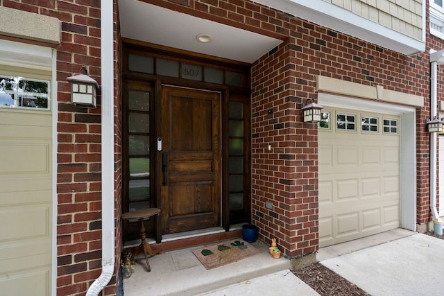 507 Grove Ln Unit H, Forest Park, IL 60130 - property entrance with brick siding and a garage