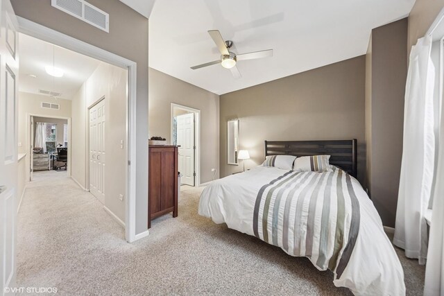 507 Grove Ln Unit H, Forest Park, IL 60130 - bedroom featuring light colored carpet, ceiling fan, visible vents, and baseboards