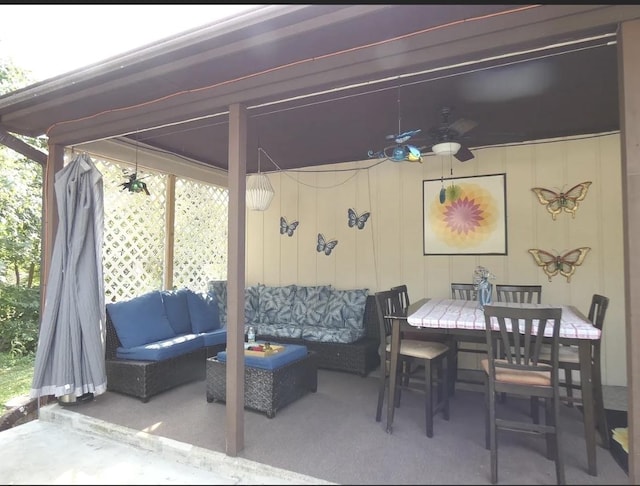 view of patio / terrace with an outdoor hangout area, outdoor dining area, and ceiling fan