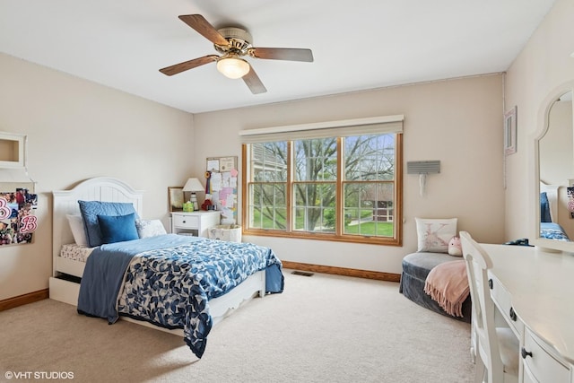 bedroom featuring baseboards, a ceiling fan, and carpet floors