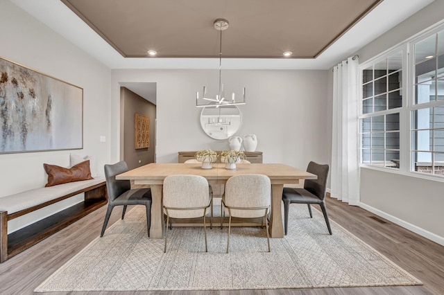 2547 Mallet Ct, Naperville, IL 60564 - living area with a baseboard heating unit, a high ceiling, wood finished floors, and baseboards