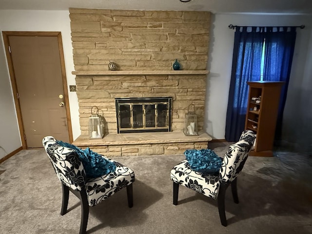 203 S Whitehead St, Tolono, IL 61880 - living room featuring carpet flooring and a stone fireplace