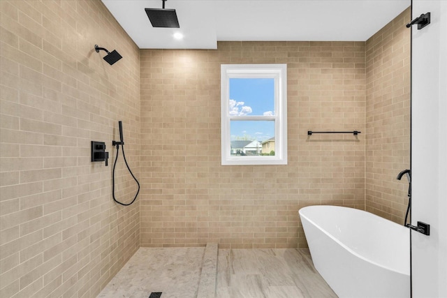 2816 Clarion Rd, Urbana, IL 61802 - full bath with a soaking tub, a tile shower, and tile walls