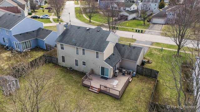 birds eye view of property with a residential view