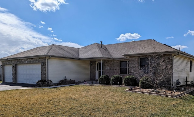 ranch-style home featuring roof with shingles, an attached garage, driveway, a front yard, and brick siding