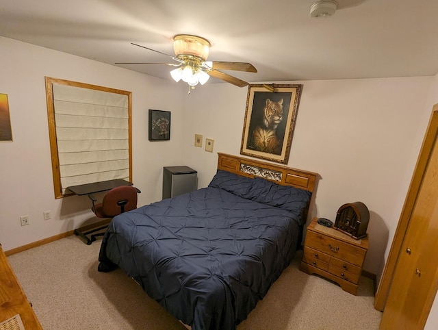 bedroom featuring carpet, baseboards, and ceiling fan