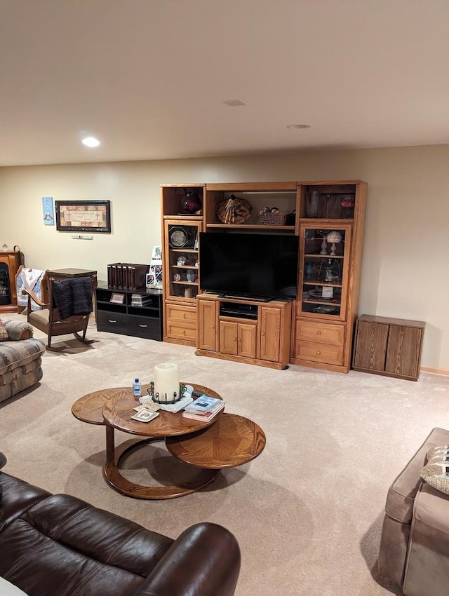 carpeted living room featuring recessed lighting