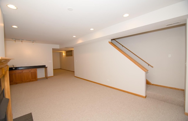 4312 S Saint Lawrence Ave Unit 1, Chicago, IL 60653 - unfurnished living room with baseboards, recessed lighting, and light carpet