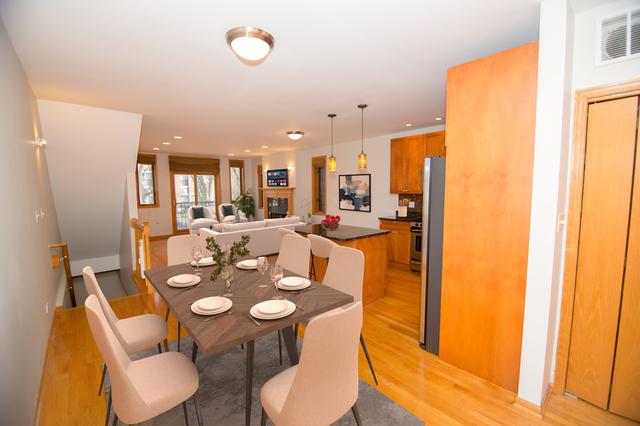 4312 S Saint Lawrence Ave Unit 1, Chicago, IL 60653 - dining space featuring visible vents, recessed lighting, and light wood-type flooring