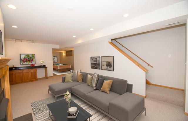 4312 S Saint Lawrence Ave Unit 1, Chicago, IL 60653 - living area with pool table, recessed lighting, and light colored carpet