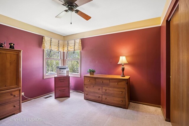 4230 Forest Glen Dr, Hoffman Estates, IL 60192 - bedroom featuring light colored carpet, baseboards, a desk, and a ceiling fan