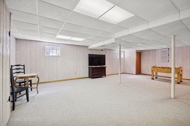 4230 Forest Glen Dr, Hoffman Estates, IL 60192 - basement with carpet flooring, a paneled ceiling, baseboards, and wood walls