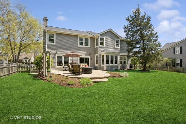 4230 Forest Glen Dr, Hoffman Estates, IL 60192 - rear view of house with a chimney, a patio area, and central AC unit
