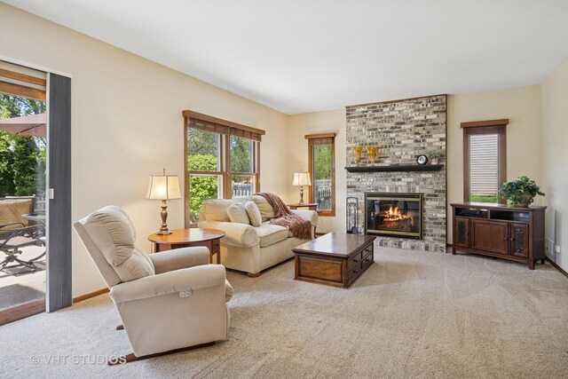 4230 Forest Glen Dr, Hoffman Estates, IL 60192 - living room featuring carpet, a fireplace, and baseboards