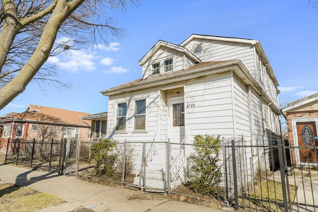 9241 S Blackstone Ave, Chicago, IL 60619 - bungalow-style home with a gate and a fenced front yard