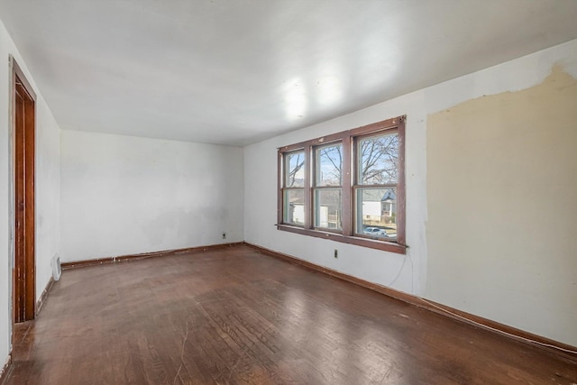 9241 S Blackstone Ave, Chicago, IL 60619 - empty room with baseboards and wood finished floors