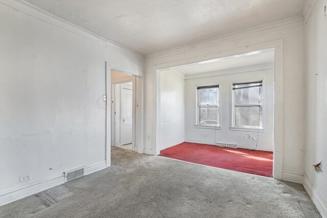 9241 S Blackstone Ave, Chicago, IL 60619 - carpeted spare room with visible vents and crown molding