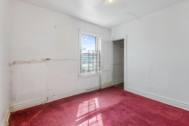 9241 S Blackstone Ave, Chicago, IL 60619 - unfurnished bedroom with carpet flooring and visible vents