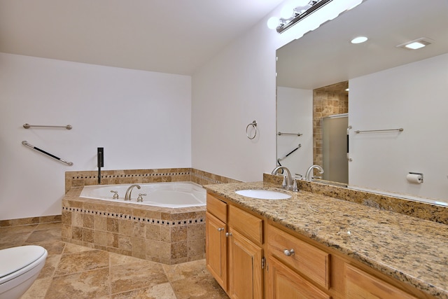 7420 W Lawrence Ave Unit 402, Harwood Heights, IL 60706 - full bathroom featuring toilet, vanity, a garden tub, and a stall shower