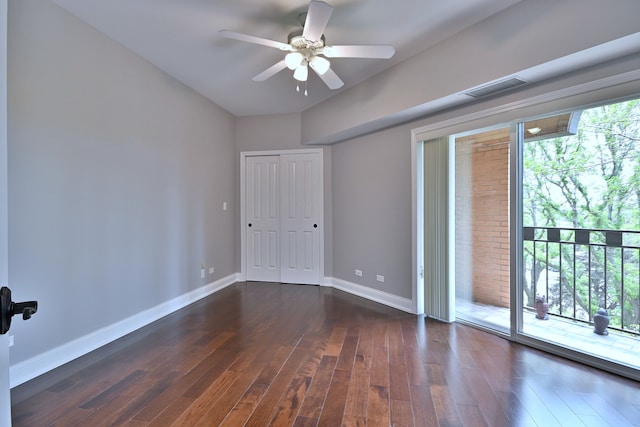7420 W Lawrence Ave Unit 402, Harwood Heights, IL 60706 - empty room featuring ceiling fan, dark wood-style floors, and baseboards