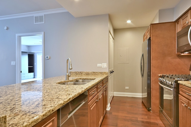 7420 W Lawrence Ave Unit 402, Harwood Heights, IL 60706 - kitchen featuring a sink, appliances with stainless steel finishes, brown cabinetry, dark wood finished floors, and recessed lighting