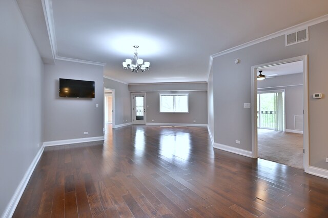7420 W Lawrence Ave Unit 402, Harwood Heights, IL 60706 - unfurnished living room featuring a chandelier, crown molding, baseboards, and dark wood finished floors