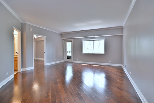 7420 W Lawrence Ave Unit 402, Harwood Heights, IL 60706 - spare room with ornamental molding, dark wood finished floors, and baseboards