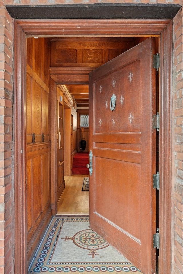 4923 S Greenwood Ave, Chicago, IL 60615 - corridor featuring brick wall and wooden walls