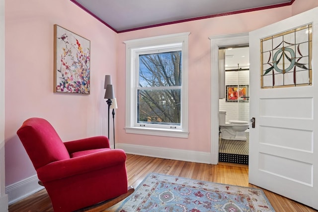 4923 S Greenwood Ave, Chicago, IL 60615 - sitting room with wood finished floors and ornamental molding